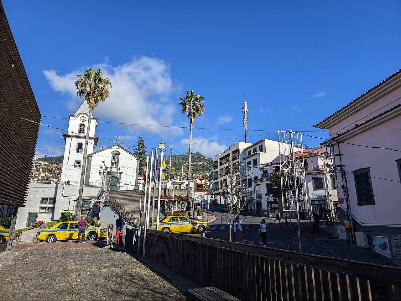 The church and streets of Estreito de Câmara de Lobos, a starting view for a village walk.